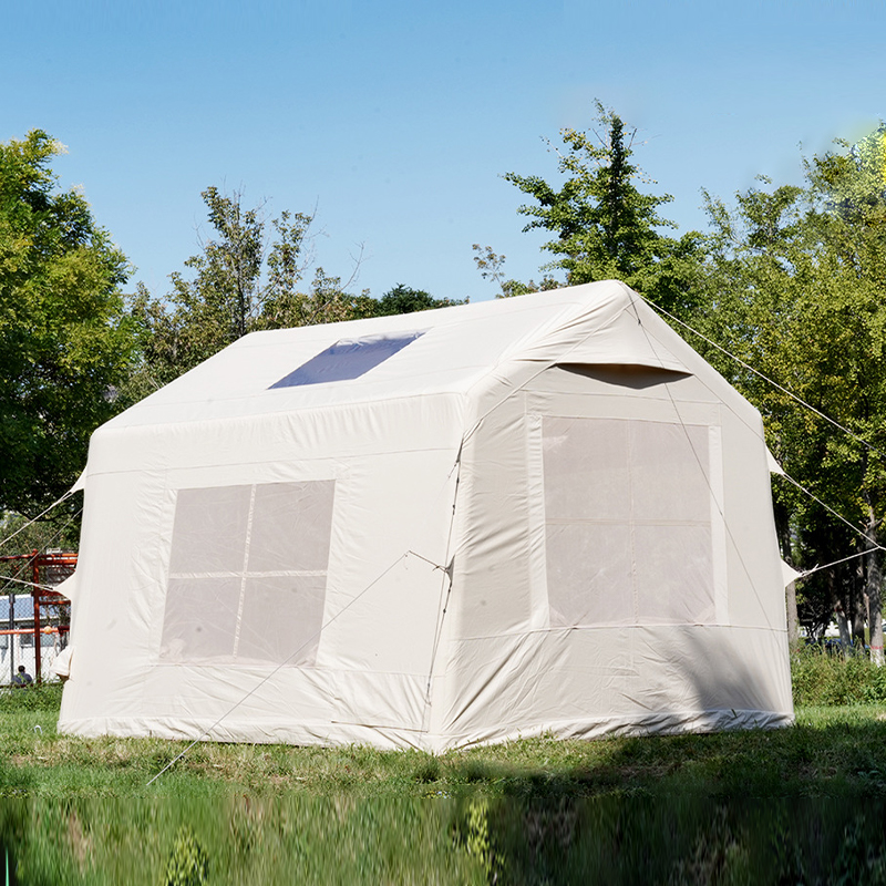 Tienda inflable con sombrilla y protección solar